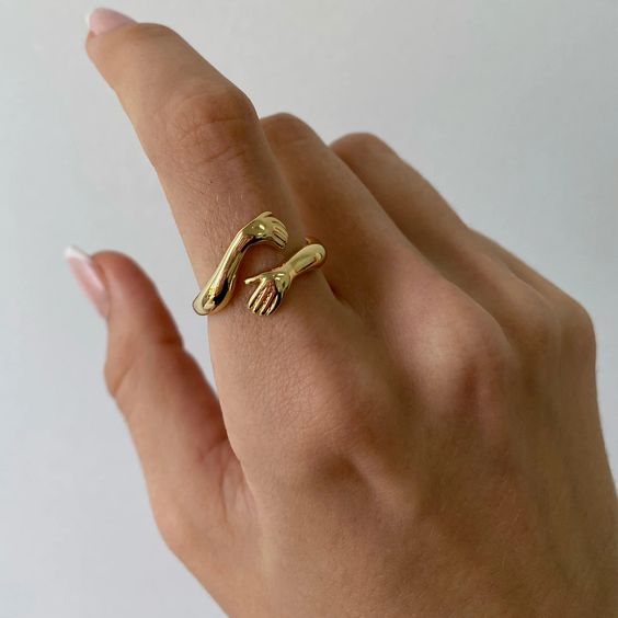 Hands Embracing Ring