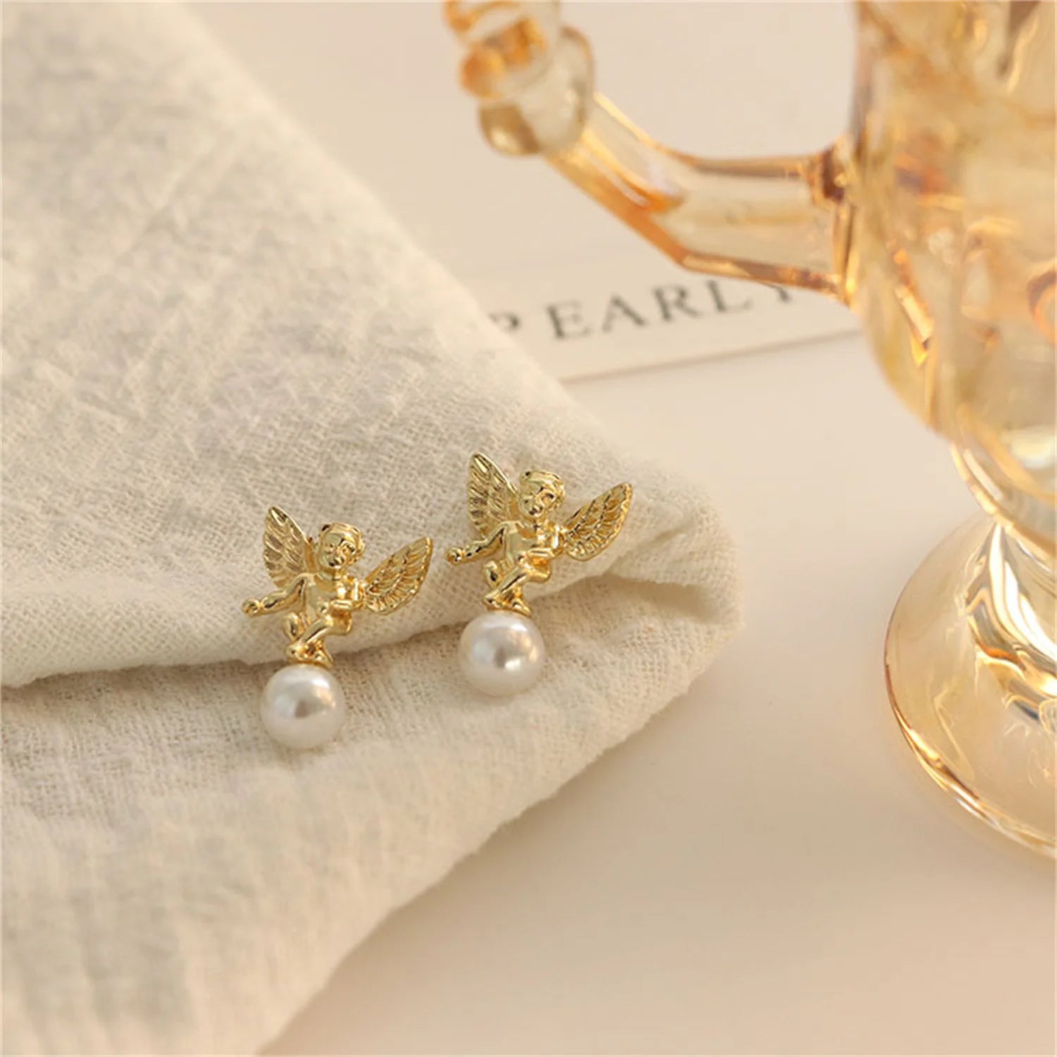 Angel and Pearl Stud Earrings