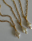 Elegant Pearl Cross Necklace